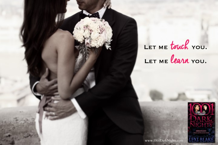 Detail of a bride and groom embracing. Bride holding beautiful wedding bouquet